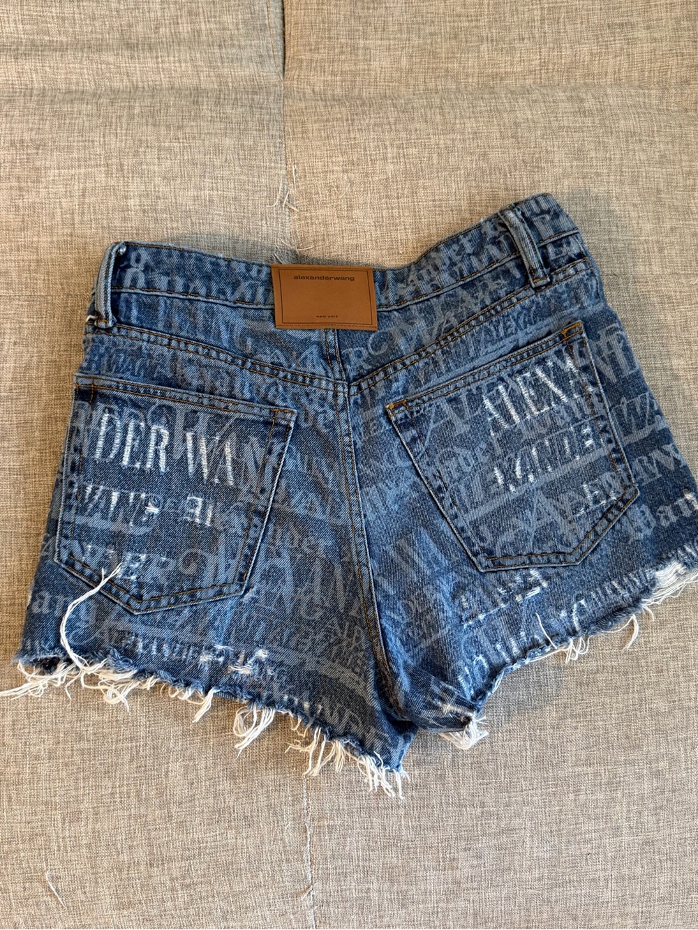 Alexander Wang Distressed Logo-Print Indigo Denim Shorts - Picture 2 of 2
